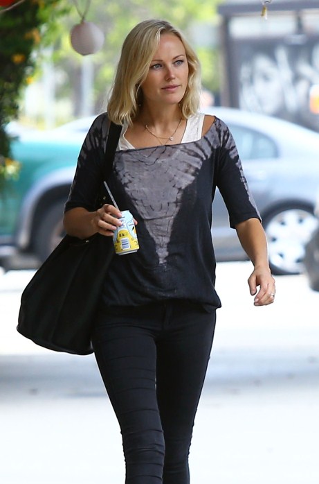 Malin Aikerman takes a stroll with her her rocker husband Roberto Zincone in Los Angeles, CA on October 5th, 2012. The two recently announced they are having a baby together.