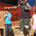 'Blink 182' drummer Travis Barker takes his kids Alabama and Landon to the Mr. Bones pumpkin patch in West Hollywood, CA on October 18, 2012.
