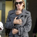 Uma Thurman and Rosalind Luna arrive at Heathrow Airport from Los Angeles on October 17, 2012 in London, England.
