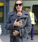 Uma Thurman and Rosalind Luna arrive at Heathrow Airport from Los Angeles on October 17, 2012 in London, England.