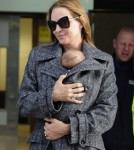 Uma Thurman and Rosalind Luna arrive at Heathrow Airport from Los Angeles on October 17, 2012 in London, England.