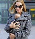 Uma Thurman and Rosalind Luna arrive at Heathrow Airport from Los Angeles on October 17, 2012 in London, England.