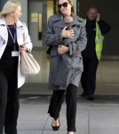 Uma Thurman and Rosalind Luna arrive at Heathrow Airport from Los Angeles on October 17, 2012 in London, England.