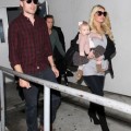 A Pregnant Jessica Simpson Arriving On A Flight At LAX With Her Family