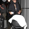 Molly Sims and Son Brooks Arrive at LAX