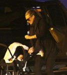 Molly Sims and Son Brooks Arrive at LAX