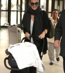 Molly Sims and Son Brooks Arrive at LAX