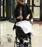 Molly Sims and Son Brooks Arrive at LAX