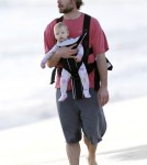 Eric Johnson Takes Maxwell On A Sunrise Walk On The Beach