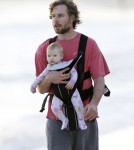 Eric Johnson Takes Maxwell On A Sunrise Walk On The Beach