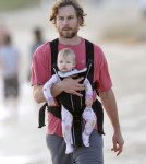 Eric Johnson Takes Maxwell On A Sunrise Walk On The Beach