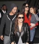 Khloe & Kourtney Kardashian Land At LAX