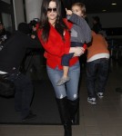 Khloe & Kourtney Kardashian Land At LAX