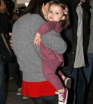 Victoria Beckham And Daughter Harper Arriving On A Flight At LAX