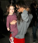 Victoria Beckham And Daughter Harper Arriving On A Flight At LAX