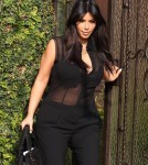 Pregnant Kim Kardashian Leaves Her Home