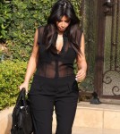 Pregnant Kim Kardashian Leaves Her Home