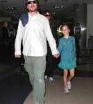 Christian Bale And Family Arriving On A Flight At LAX