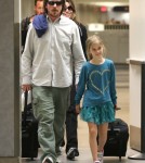 Christian Bale And Family Arriving On A Flight At LAX