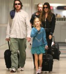 Christian Bale And Family Arriving On A Flight At LAX
