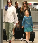 Christian Bale And Family Arriving On A Flight At LAX