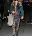 Exclusive... Pregnant Fergie Touches Down In Paris