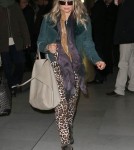 Exclusive... Pregnant Fergie Touches Down In Paris