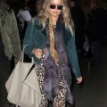 Exclusive... Pregnant Fergie Touches Down In Paris