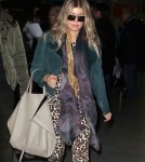 Exclusive... Pregnant Fergie Touches Down In Paris