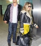Pregnant Fergie & Josh Land In London