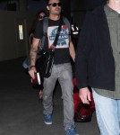 Megan Fox & Brian Austin Green Departing On A Flight At LAX