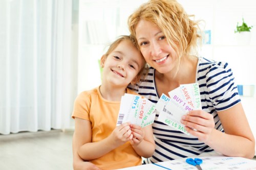 mom-and-daughter-cutting-coupons (500 x 333)
