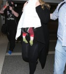 Shy Adele And Family Departing On A Flight At LAX