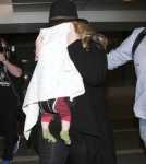 Shy Adele And Family Departing On A Flight At LAX