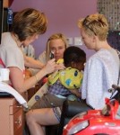 Charlize Theron Takes Son Jackson for a Trim