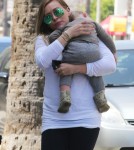 Hilary Duff Out And About With A Sleepy Luca