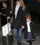 Jessica Alba & Daughter Honor Arriving On A Flight At LAX