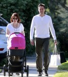 Alyson Hannigan And Her Husband Take Their Daughter For A Stroll