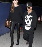 Angelina Jolie and Maddox Arrive On A Flight At LAX