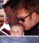 Elton John & Family Arrive In Venice