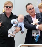 Elton John & Family Arrive In Venice