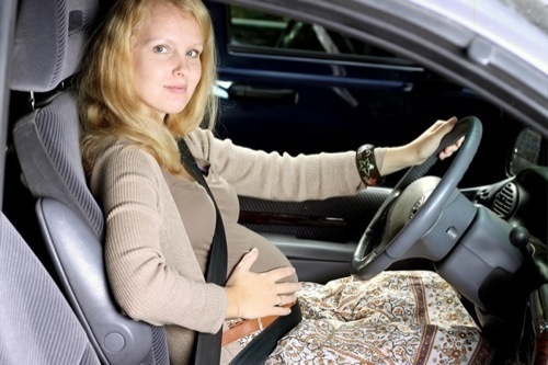 Pregnant women in car