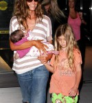 Denise Richards, is seen at JFK Airport with her newly adopted baby Eloise Joni accompanied by her two daughters Sam and Lola Sheen