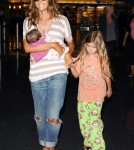 Denise Richards, is seen at JFK Airport with her newly adopted baby Eloise Joni accompanied by her two daughters Sam and Lola Sheen