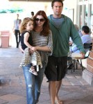 Alyson Hannigan grocery shops with her family at Ralphs in Malibu, Ca on August 13, 2011.