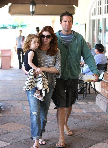 Alyson Hannigan grocery shops with her family at Ralphs in Malibu, Ca on August 13, 2011.