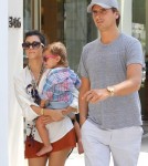 Mason Disick with mommy Kourtney Kardashian and daddy Scott Disick this afternoon in Los Angeles, Ca on August 13, 2011