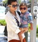 Mason Disick with mommy Kourtney Kardashian and daddy Scott Disick this afternoon in Los Angeles, Ca on August 13, 2011