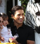 Mario Lopez leaves a private party with girlfriend Courtney Mazza and baby Gia Francesca Lopez.