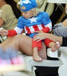 Zuma Rossdale in a Captain America costume as he gets his toes done